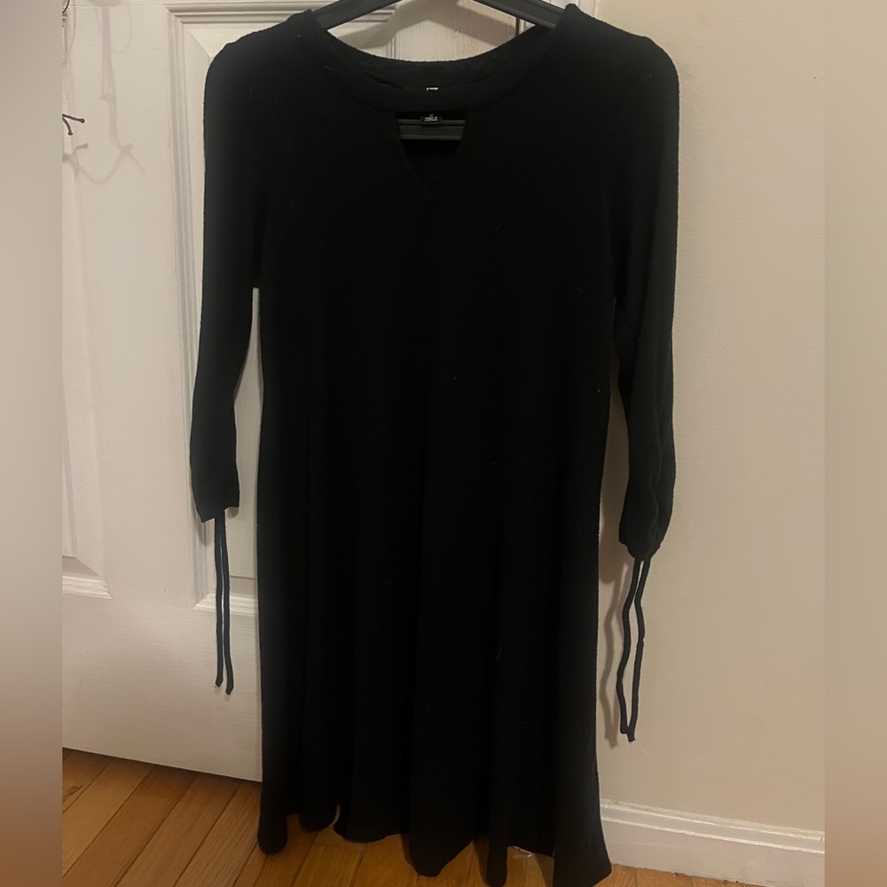 Black long sleeve dress with triangle cut out in front